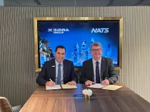 Foto tras la firma del Memorando de Entendimiento entre NATS e Indra.
